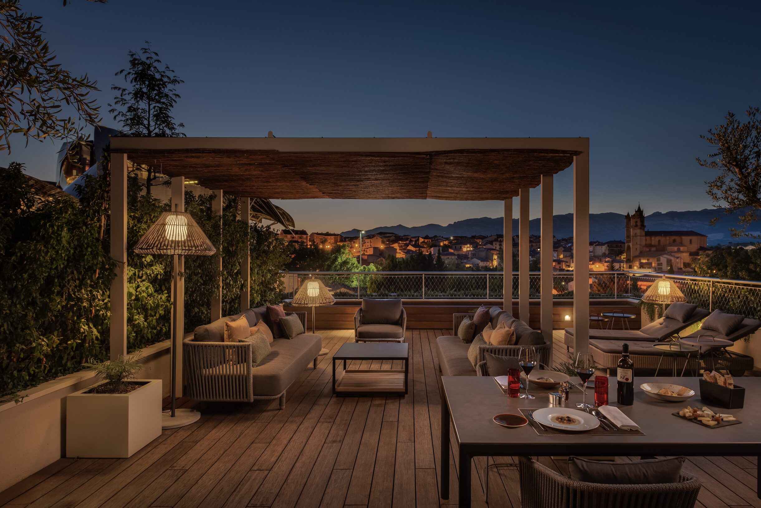 The Riscal Suite Terrace surprises with views that juxtapose the architecture of Frank Gehry with that of the sixteenth century
